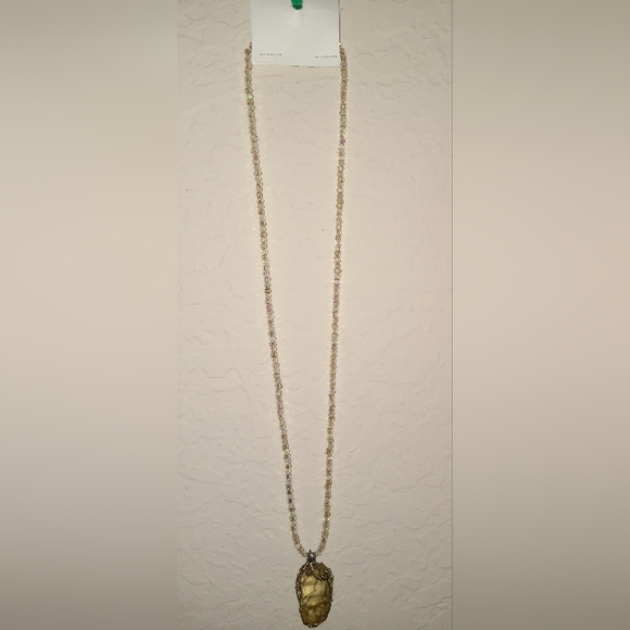 Quartz crystal emblem on a beaded necklace. - Picture 3 of 3